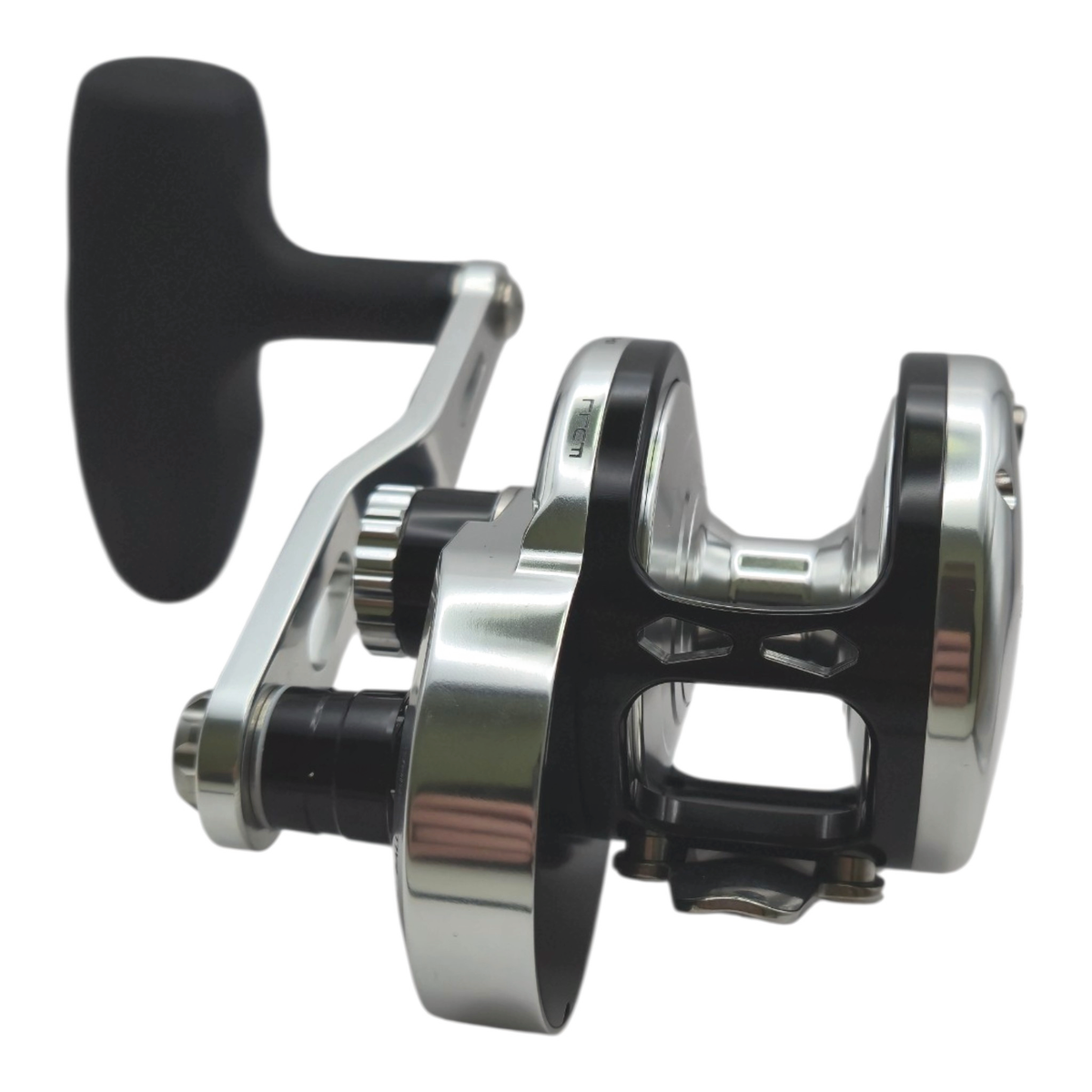 Opposite view of the Johnny Jigs Elite 15H jigging reel showing the frame and spool