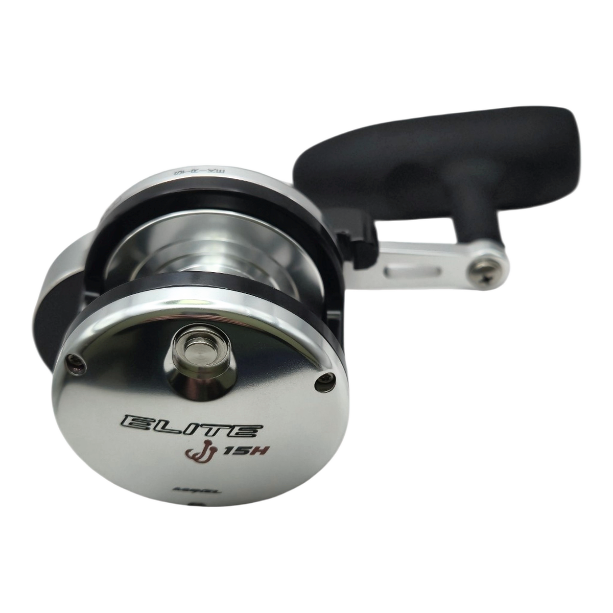 Angled view of the Johnny Jigs Elite 15H jigging reel showing the spool and rubber T-bar handle